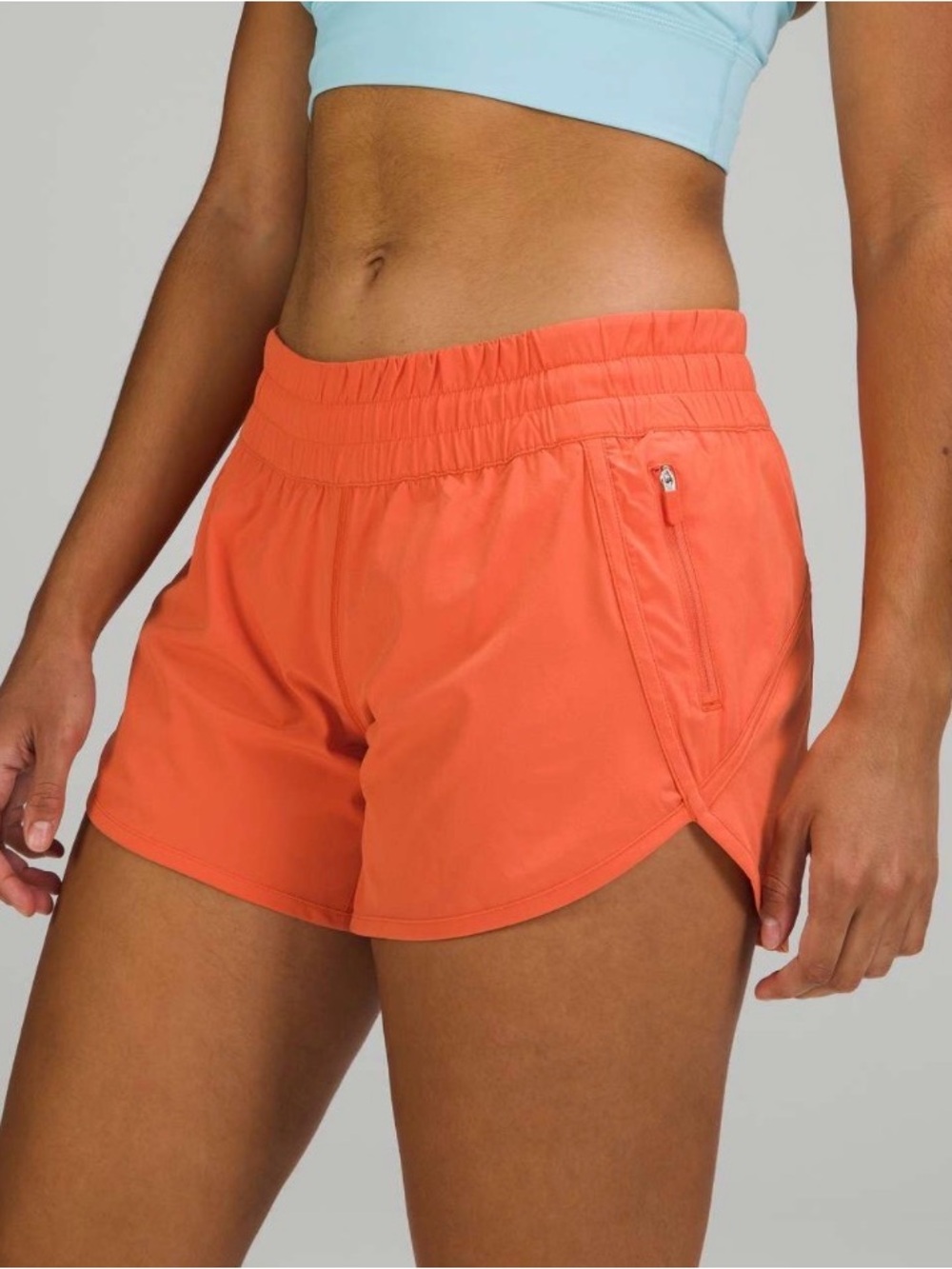 Lululemon Tracker Short 4" in
Warm Coral Size 18
